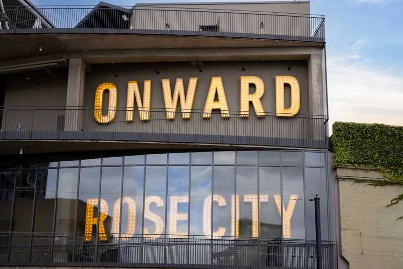 Onward Rose City mural on the side of Providence Park