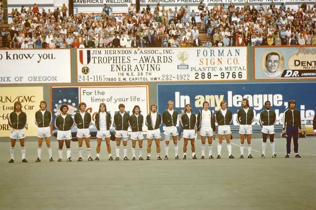 Vintage photo of Portland Timbers soccer team lined up on the field